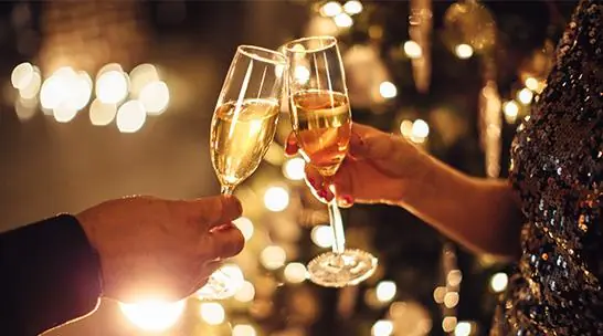 People cheers with champagne