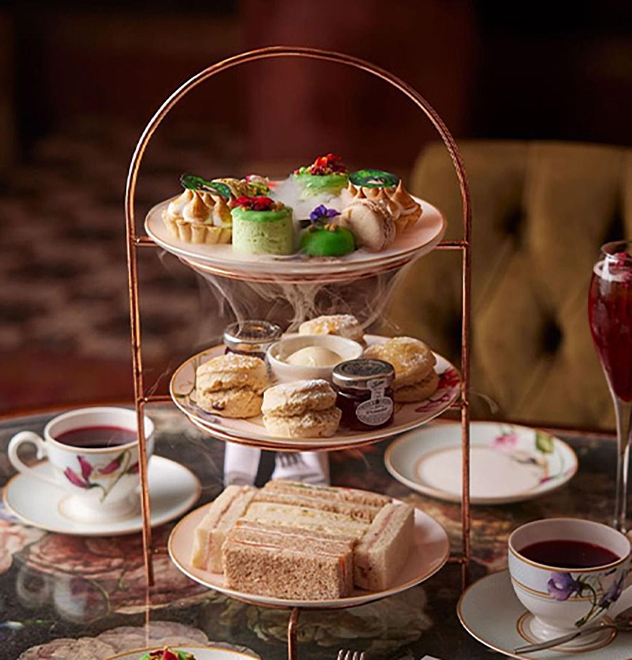 Wicked themed afternoon tea with sweet treats and sandwiches