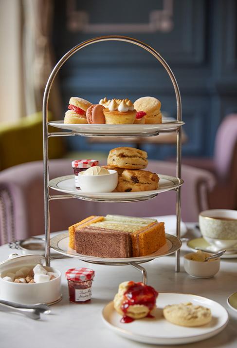 Clermont Charing Cross - Assortment of cakes and sandwiches afternoon tea