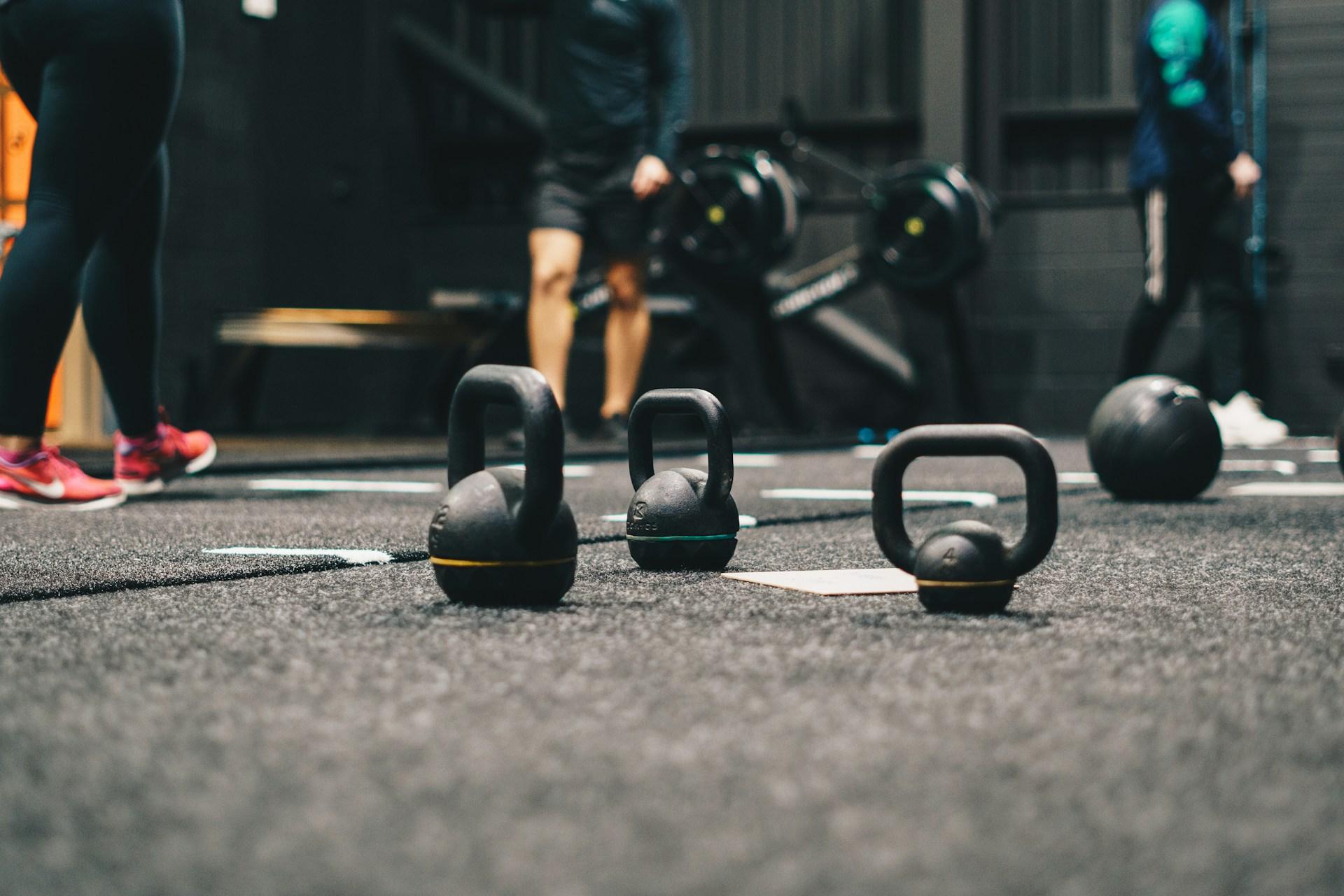 Fitness Classes in London The Clermont Charing Cross Blog kettlebells sit on the floor in a gym